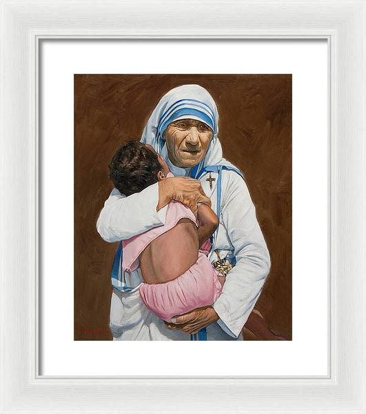 Mother Teresa holding a child - Framed Print