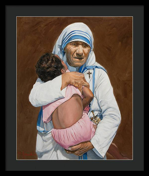 Mother Teresa holding a child - Framed Print