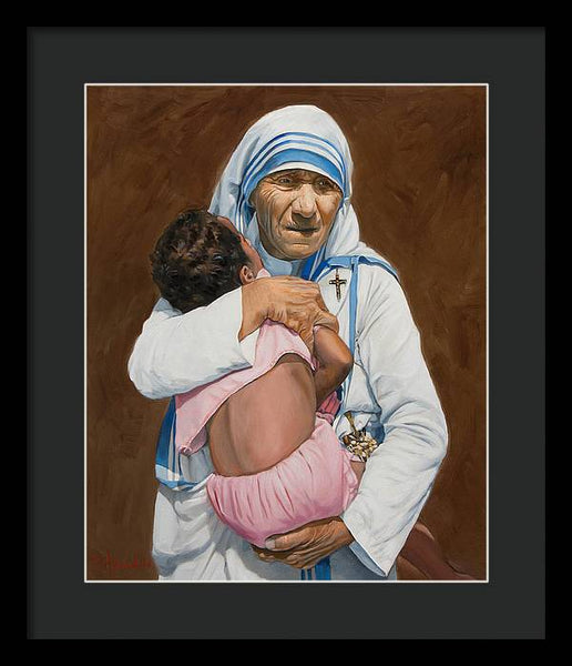 Mother Teresa holding a child - Framed Print