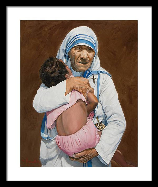 Mother Teresa holding a child - Framed Print