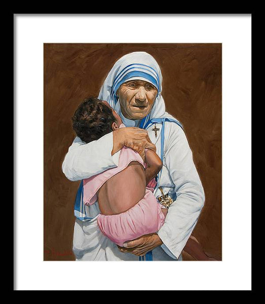 Mother Teresa holding a child - Framed Print