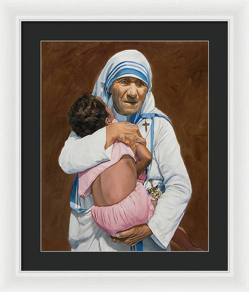 Mother Teresa holding a child - Framed Print