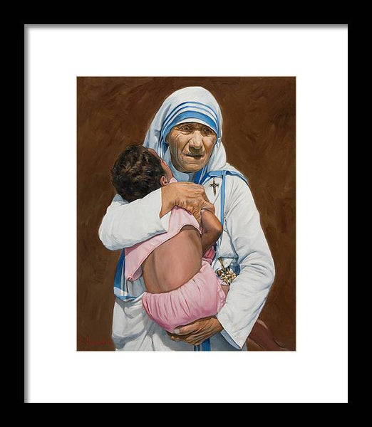 Mother Teresa holding a child - Framed Print