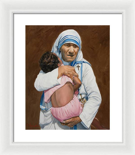 Mother Teresa holding a child - Framed Print