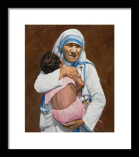 Mother Teresa holding a child - Framed Print