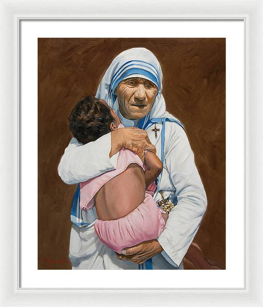 Mother Teresa holding a child - Framed Print