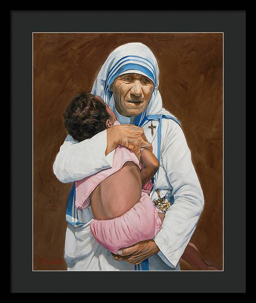 Mother Teresa holding a child - Framed Print