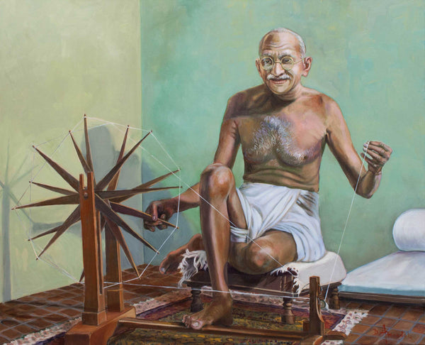 Mahatma Gandhi spinning
