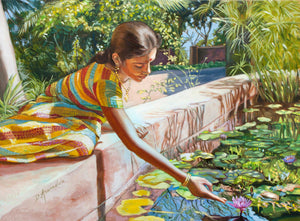 Indian girl near the waterlilies