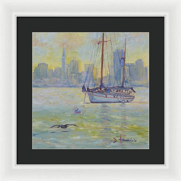Sailboat anchored at sunset - Framed Print